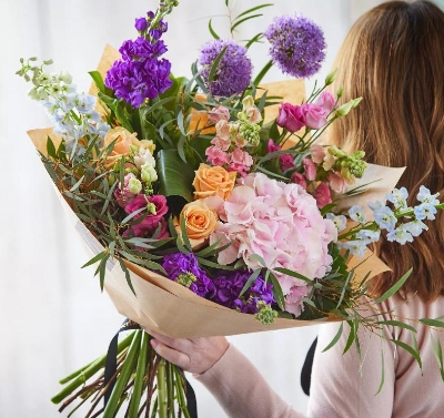 Hand tied bouquet made with the finest flowers