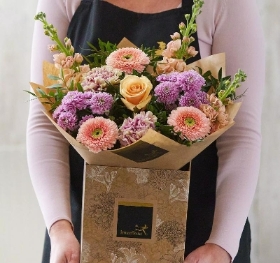 Hand tied bouquet made with the finest flowers