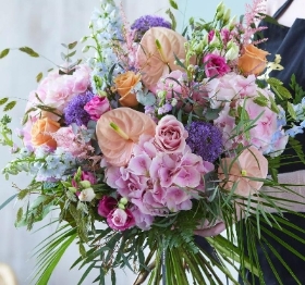 Hand tied bouquet made with the finest flowers