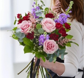 Lily free hand tied bouquet made with the finest flowers