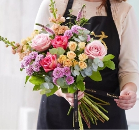 Lily free hand tied bouquet made with the finest flowers