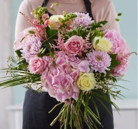 Lily free hand tied bouquet made with the finest flowers