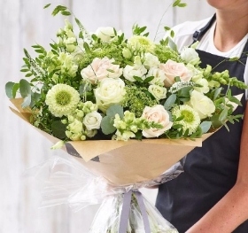 Sympathy hand tied made with the finest flowers